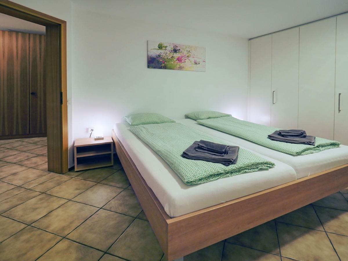 Apart Holidays - Residenza Flora Locarno Exterior foto